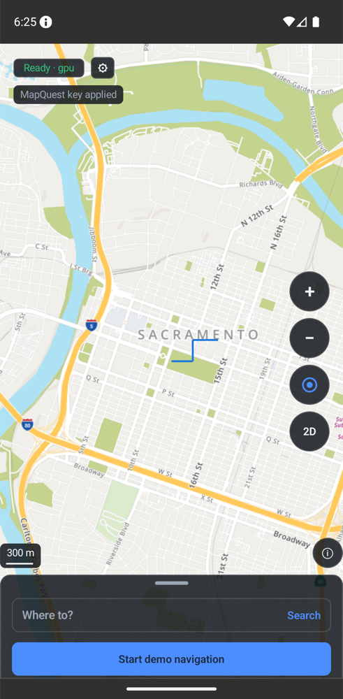 The Android reference application drawing downtown Sacramento, with the readiness chip, map controls, scale bar, the compact attribution info control at the map’s end edge and the search dock