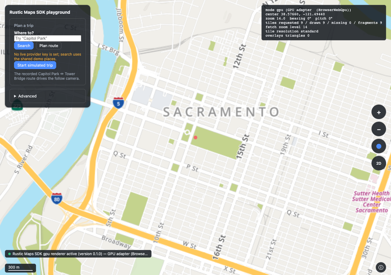 The wasm playground rendering the same Sacramento camera on a WebGPU canvas, with the Plan a trip card, the map controls and the compact attribution info control at the end edge